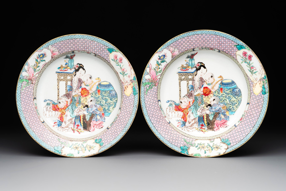 An extremely fine pair of Chinese famille rose ruby-back eggshell plates with a lady and playing boys, Yongzheng