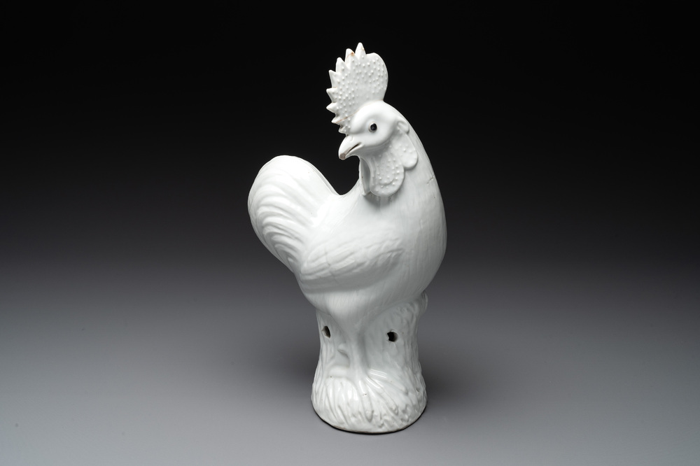 A Chinese white-glazed model of a rooster, 18/19th C.