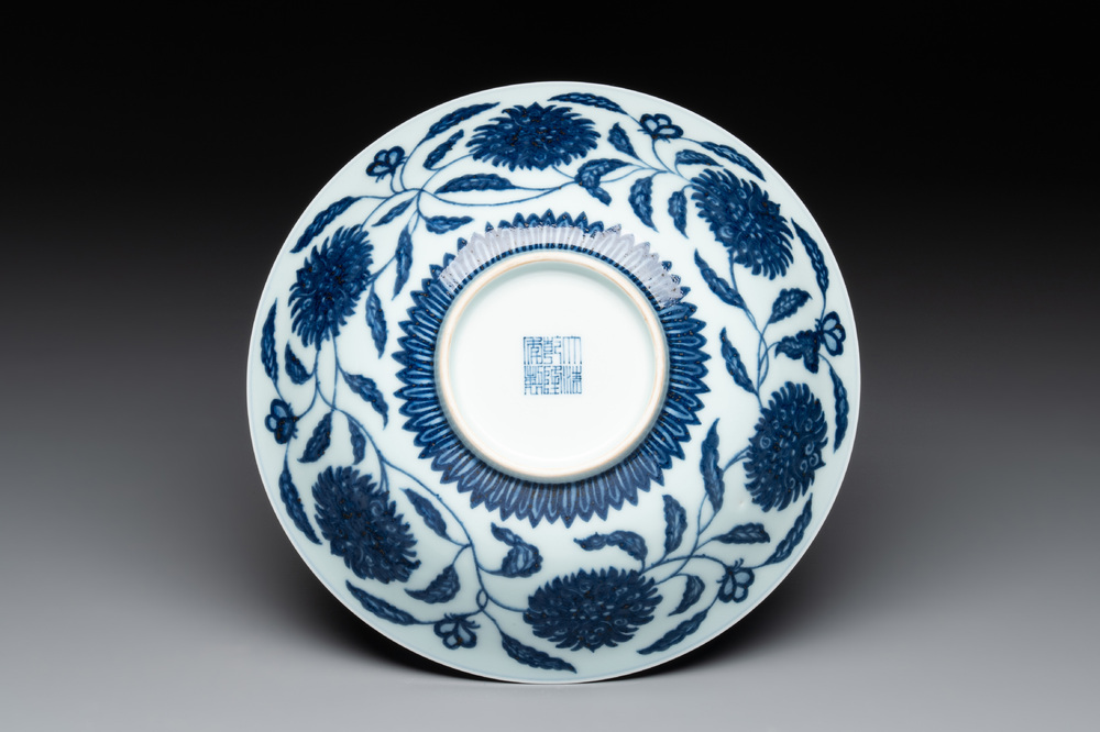 A Chinese blue and white 'flower scroll' bowl, Qianlong mark, 20th C.