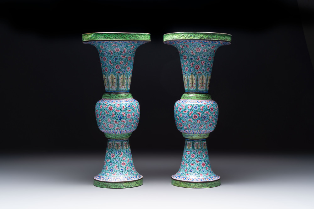 A pair of Chinese Canton enamel 'gu' vases with floral design, Qianlong