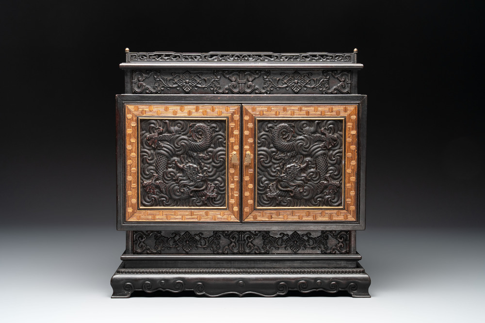 A Chinese zitan cabinet of curiosities with five-clawed dragons, 19/20th C.