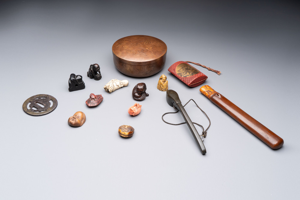 Nine various Japanese netsuke, an inro, a tsuba, a yatate, a bamboo kiseruzutsu and a covered bronze box, Edo/Meiji, 19th C.