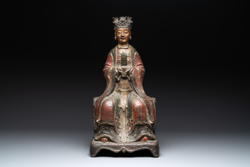 A large Chinese polychrome-lacquered and gilt bronze Daoist immortal, 17th C.