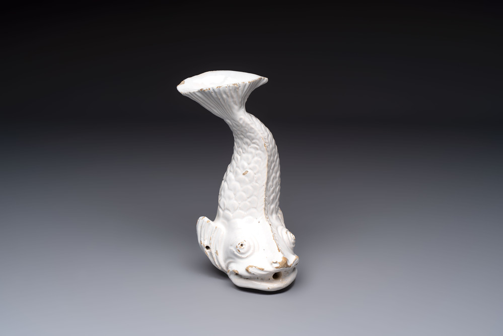 A rare white-glazed Delftware dolphin-shaped fountain, 18th C.