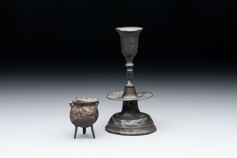 A miniature pewter candlestick and grape, excavated in Rotterdam, 16/17th C. or earlier