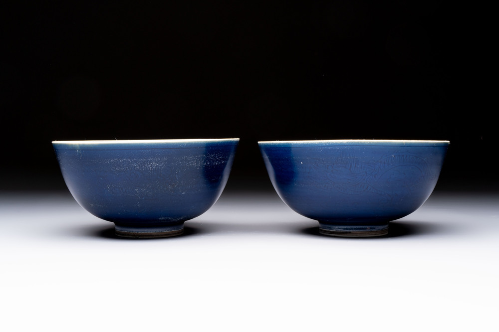 A pair of Chinese blue-glazed 'Hatcher Cargo' bowls with incised dragons, Transitional period