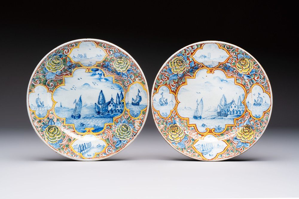 A pair of fine polychrome Dutch Delft 'Coastal View' plates, 18th C.