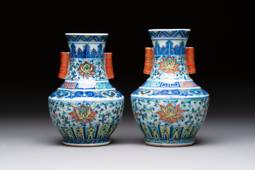 A pair of Chinese doucai 'Hu' vases with lotus scroll design, Qianlong mark, 19th C.