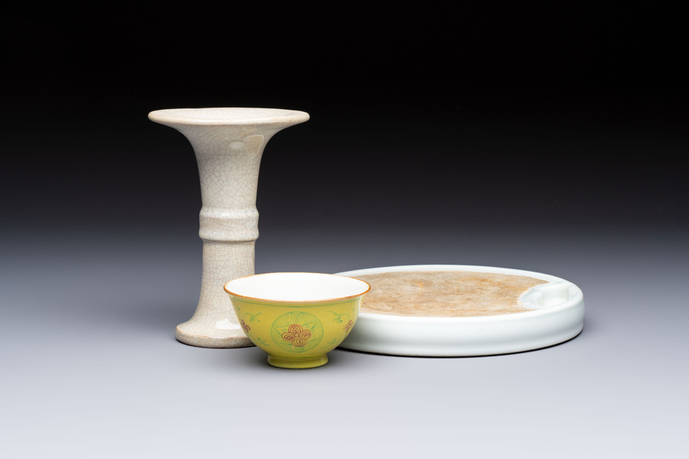 A Chinese Ge-ware archaistic 'Gu' vase, a white-glazed anhua-decorated ink stone and a yellow-ground bowl, 20th C.