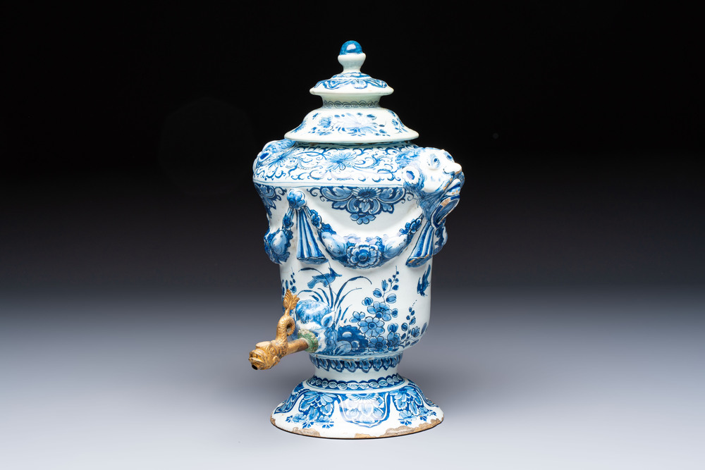 A blue and white Dutch Delft urn-shaped table fountain and cover, early 18th C.