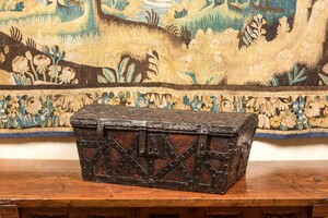 An iron-mounted wooden coffer, 17th C.