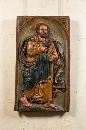 A large Spanish polychrome wooden alto relievo depicting Saint Peter, 17th C.