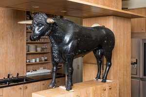 A large painted wooden model of a bull, early 20th C.