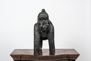 A black painted polystone gorilla with young, 20th C.