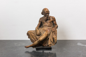 A walnut figure of Saint Jerome seated and partly undressed, 17/18th C.