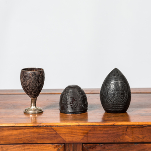 A carved coconut cup on silvered stand and two goblets, French colonies, 19th C.