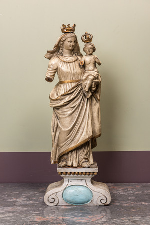 A polychromed wooden Madonna and Child on stand, 17/18th C.