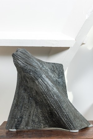 A modified granite sculpture, 20th C.