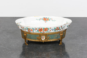 A French gilt bronze-mounted famille verte-style porcelain centerpiece with Chantilly mark, Samson, 19th C.