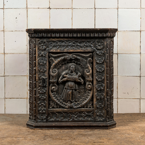 A small dark-patinated wooden corner cabinet with a shepherdess, 17th C. and later