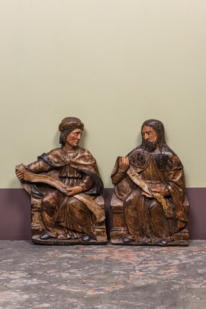 A pair of Spanish polychrome walnut reliefs depicting two prophets, Valladolid, 2nd half 16th C.