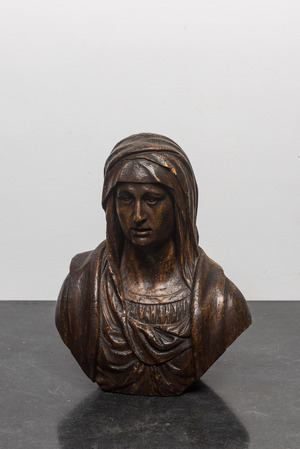 A brown-patinated wooden bust of a female saint, 18th C.