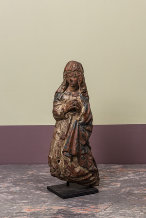 A polychrome walnut Virgin from an Annunciation, Southern Netherlands, 1st half 16th C.