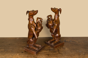 A pair of English wooden greyhounds with a shield, 19th C.