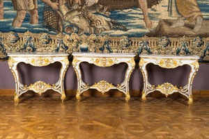 A pair of painted and gilt wooden rocaille console tables and a jardinière, France, 19/20th C.