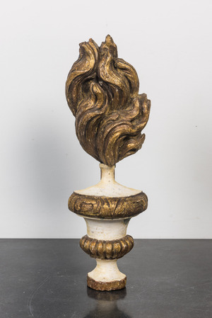 A gilt and painted wooden ornament in the shape of a burning torch, 18th C.