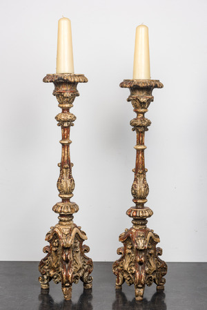 A pair of large painted wooden candlesticks, probably Italy, 18th C.