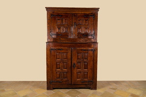 A Spanish wooden four-door cupboard with cast iron locks and hinges, 17th C.