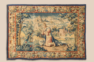 A Flemish wall tapestry with a kneeling apostle, 17th C.