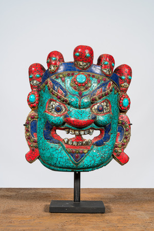 A 'Mahakala' mask in lacquered wood inlaid with semi-precious stones, Tibet, 19/20th C.