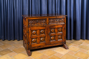 A Spanish walnut dresser with two doors and two drawers, 17th C.
