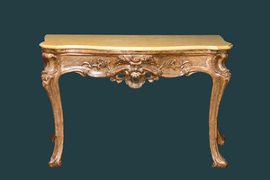 A patinated wooden rocaille table with yellow marble top, France, 18th C.