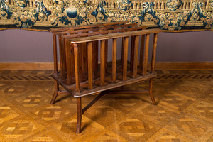 A wooden newspaper or magazine rack, 20th C.