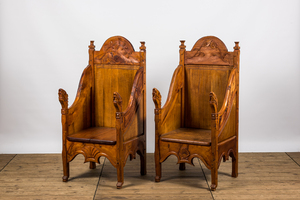 A pair of English carved wooden 'Arts and Crafts'-style chairs, 20th C.