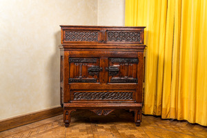 A wooden Gothic Revival buffet with older elements and wrought iron mounts, 19th C.
