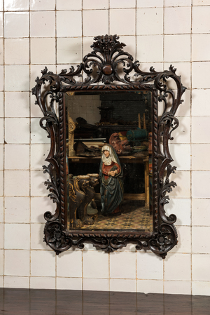 An ebonised walnut rococo-style mirror, probably Italy, 18/19th C.