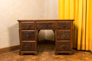 A wooden desk with six drawers with painted panels, 19th C.