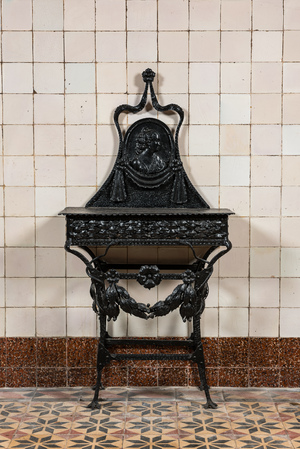 A black lacquered wrought iron 'bonheur du jour', 19th C.