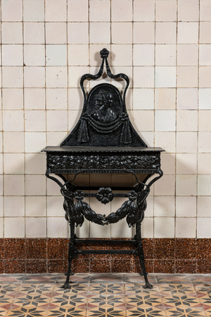 A black lacquered wrought iron 'bonheur du jour', 19th C.