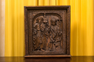 A carved oak panel depicting Saint James with a bishop, The Low Countries, late 15th C.