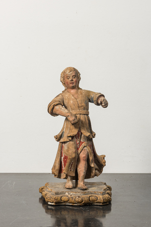 A carved wooden figure of an angel with traces of polychromy, 17/18th C.