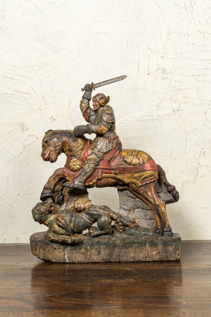A polychrome wooden group of Saint George defeating the dragon, probably Germany, 17/18th C.