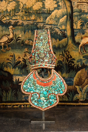 A headpiece and breastplate mounted with turquoise, coral and other stones, Nepal, 19/20th C.