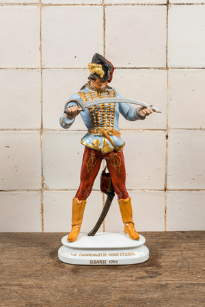 A Hungarian Herend porcelain figure of a hussar on the occasion of the 24th World Fencing Championship, Budapest, 1959