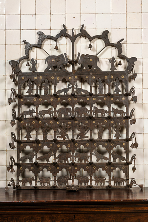 An Indian wrought iron hanging oil lamp with animals, 20th C.