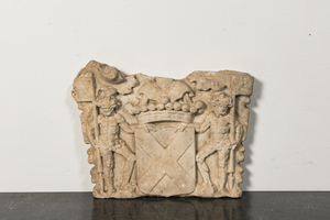 A marble relief with a coat of arms flanked by two wild men, 17th C.